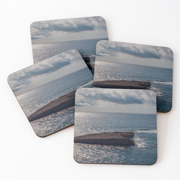 Item preview, Flat Coastal Rock Platform in Open Ocean Under Dramatic Cloudy Sky With Sunlit Water designed and sold by Nmallia.
