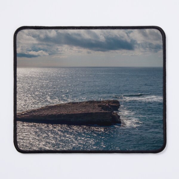 Item preview, Flat Coastal Rock Platform in Open Ocean Under Dramatic Cloudy Sky With Sunlit Water designed and sold by Nmallia.