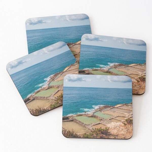 Item preview, Traditional Rocky Salt Pans Along a Turquoise Sea Coastline With Calm Waves and Cloudy Sky designed and sold by Nmallia.