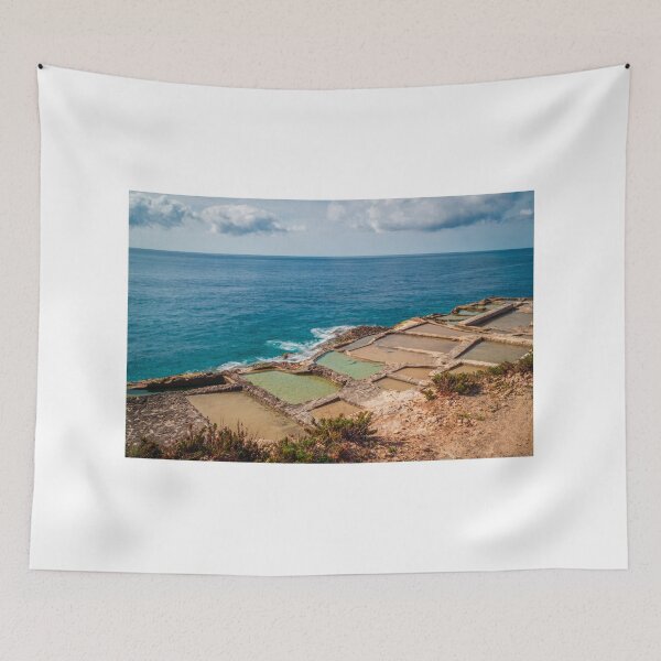 Item preview, Traditional Rocky Salt Pans Along a Turquoise Sea Coastline With Calm Waves and Cloudy Sky designed and sold by Nmallia.