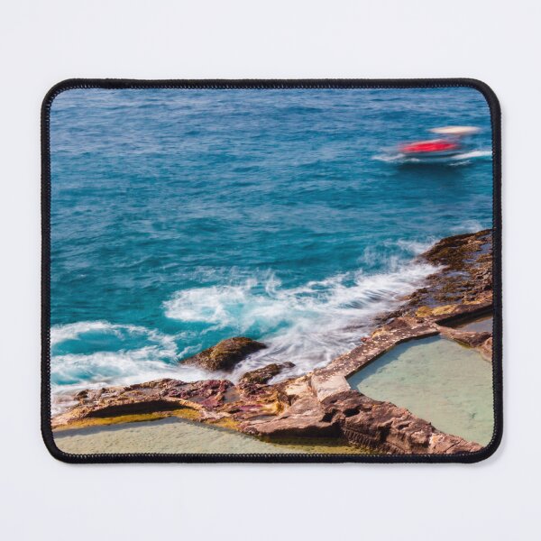 Item preview, Ocean Waves Crashing Over Rocky Coastline and Natural Rock Pools With Blurred Jet Ski in Distance designed and sold by Nmallia.