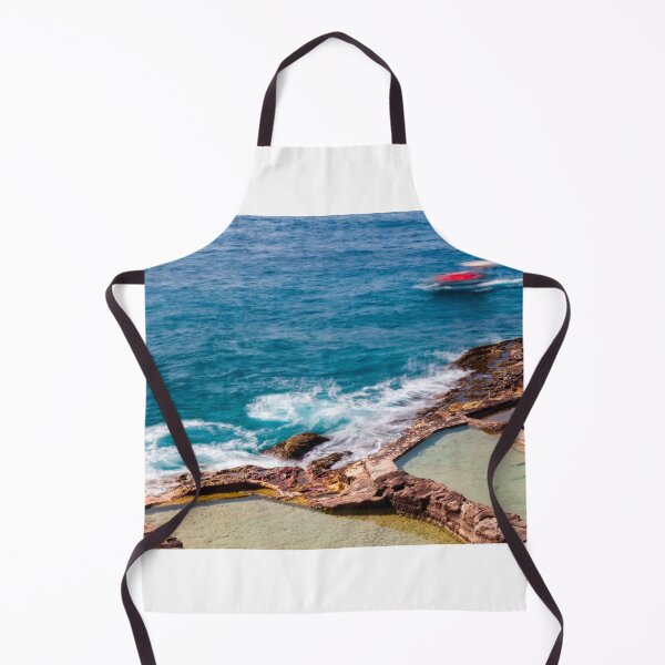 Item preview, Ocean Waves Crashing Over Rocky Coastline and Natural Rock Pools With Blurred Jet Ski in Distance designed and sold by Nmallia.