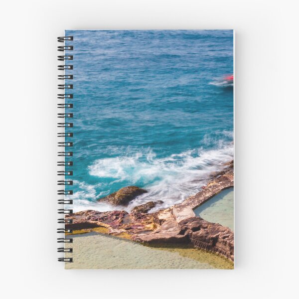 Item preview, Ocean Waves Crashing Over Rocky Coastline and Natural Rock Pools With Blurred Jet Ski in Distance designed and sold by Nmallia.