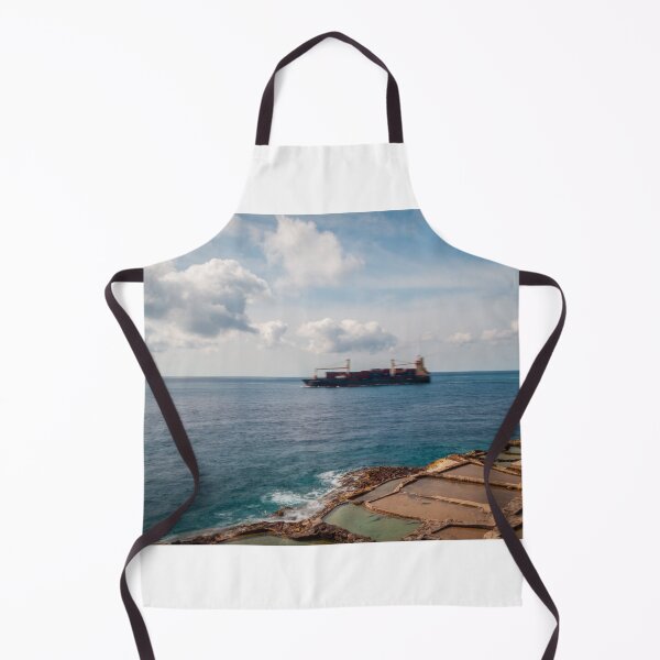Item preview, Container Ship Passing Offshore Above Coastal Salt Pans Under Blue Sky And Clouds designed and sold by Nmallia.
