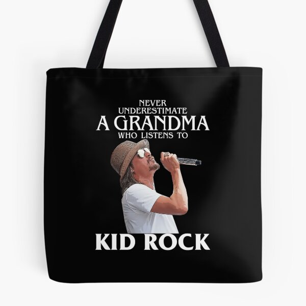Item preview, Never Underestimate A Woman Who Listens To Rock designed and sold by GrinchAndMax.