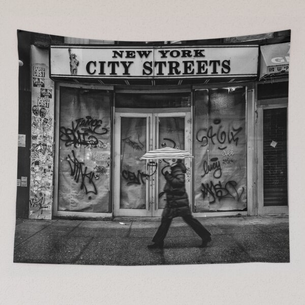 Item preview, New York city streets, woman with an umbrella next to a dilapidated storefront black and white vintage photograph poster art print designed and sold by Astrid Arkhangelsky.