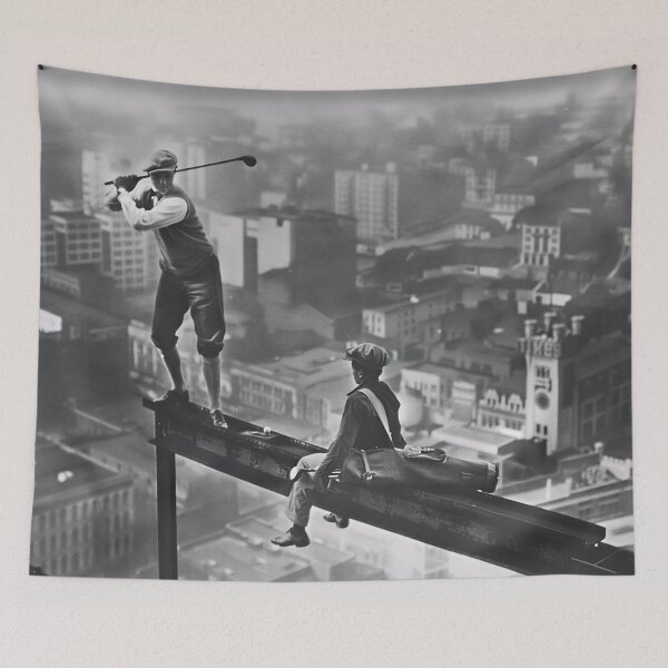 Item preview, Golf atop a skyscraper, 1932 vintage golfer and caddy on a steel girder high above New York City black and white photograph poster art print designed and sold by Astrid Arkhangelsky.