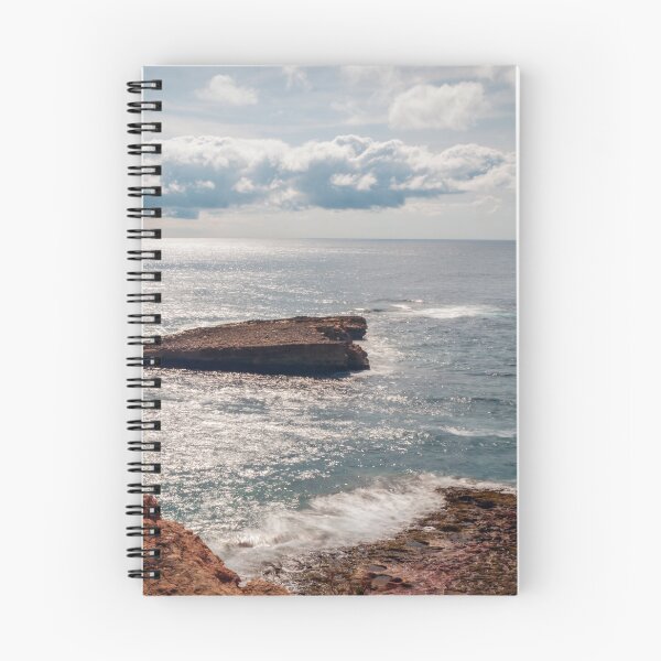 Item preview, Rocky Coastline Overlooking Calm Sea With Cargo Ship on Horizon and Sunlit Waves designed and sold by Nmallia.