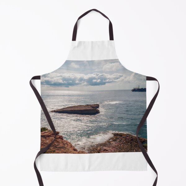 Item preview, Rocky Coastline Overlooking Calm Sea With Cargo Ship on Horizon and Sunlit Waves designed and sold by Nmallia.