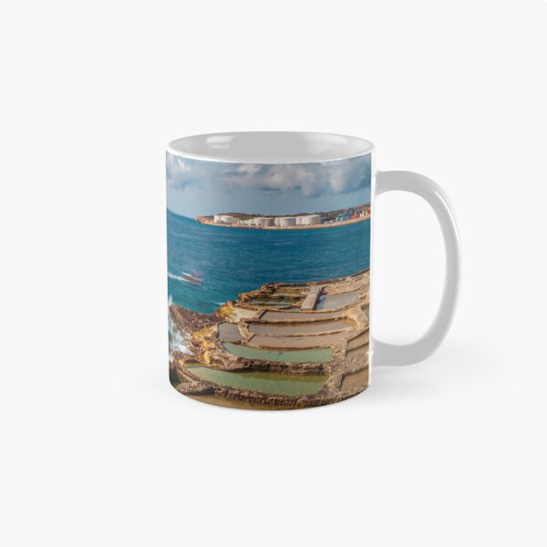Item preview, Coastal Salt Pans And Rocky Shoreline With Boats Leaving Wakes On Turquoise Sea designed and sold by Nmallia.