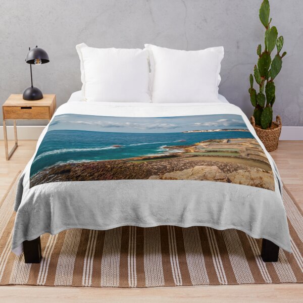 Item preview, Coastal Salt Pans And Rocky Shoreline With Boats Leaving Wakes On Turquoise Sea designed and sold by Nmallia.