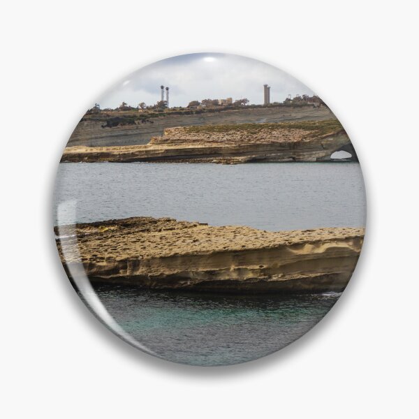 Item preview, Rocky Coastal Sea Stack and Natural Arch With Turquoise Water Under Cloudy Sky designed and sold by Nmallia.