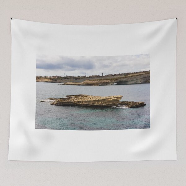 Item preview, Rocky Coastal Sea Stack and Natural Arch With Turquoise Water Under Cloudy Sky designed and sold by Nmallia.