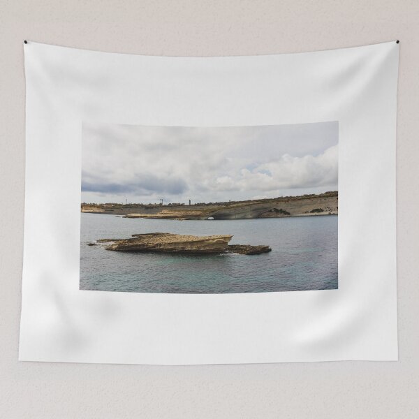 Item preview, Coastal Cliffs and Flat Rock Formation Over Calm Sea With Distant Shoreline and Cloudy Sky designed and sold by Nmallia.