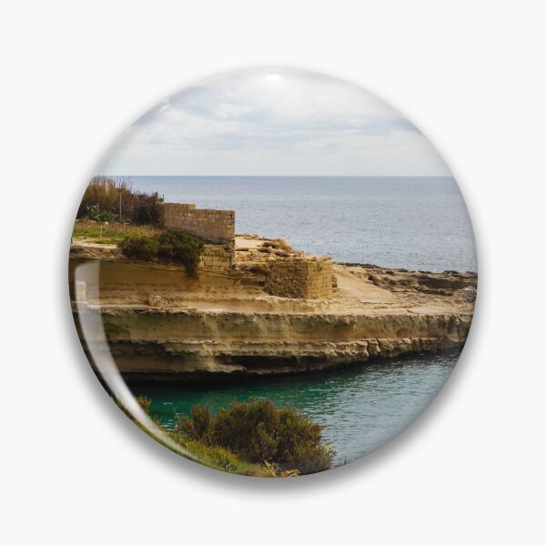 Item preview, Rocky Coastal Cliff Overlooking Calm Blue Sea and Cloudy Horizon With Vegetation in Foreground designed and sold by Nmallia.