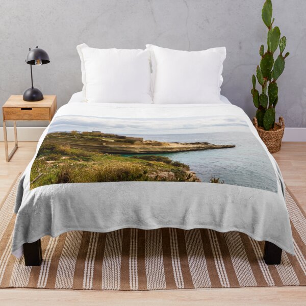 Item preview, Rocky Coastal Cliff Overlooking Calm Blue Sea and Cloudy Horizon With Vegetation in Foreground designed and sold by Nmallia.