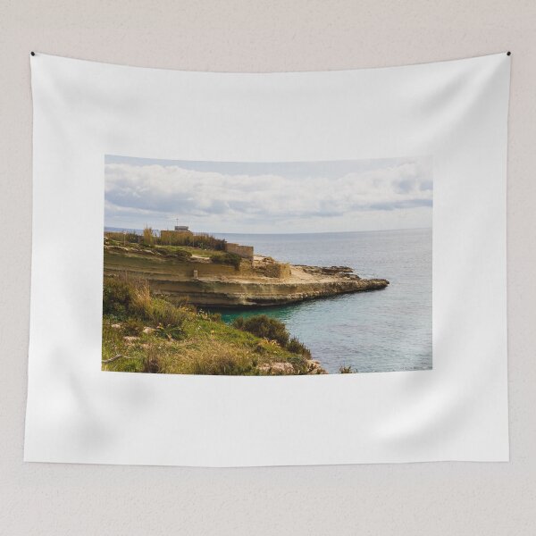 Item preview, Rocky Coastal Cliff Overlooking Calm Blue Sea and Cloudy Horizon With Vegetation in Foreground designed and sold by Nmallia.