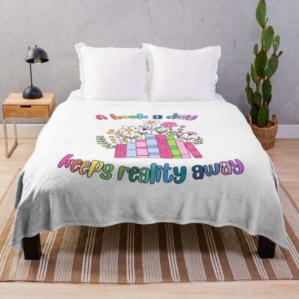 Item preview, A book a day keeps reality away | colorful flowers and books with cute rainbow lettering designed and sold by LibrarianLauren.