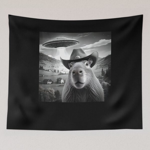Item preview, Funny Capybara Selfie Wearing Cute Hat With UFOs Weird designed and sold by Cheesymatiion.