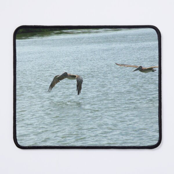 Item preview, Two Pelicans Flying Over Water designed and sold by MercerImages.
