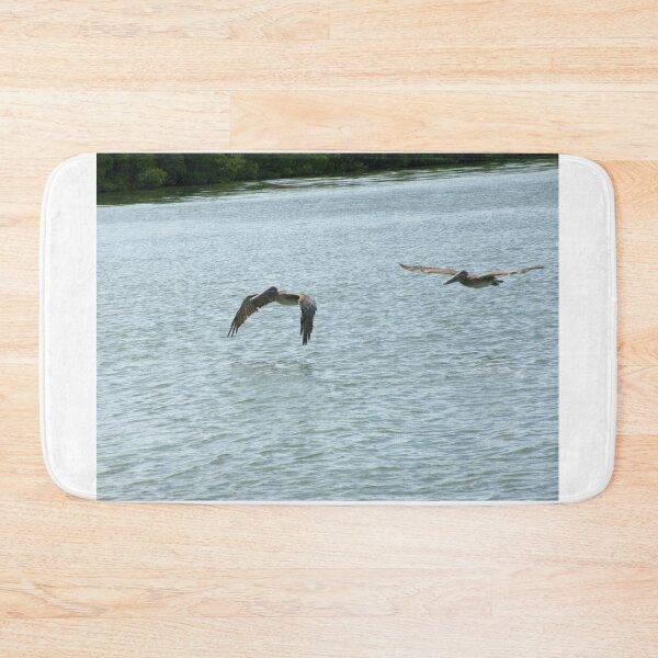 Item preview, Two Pelicans Flying Over Water designed and sold by MercerImages.
