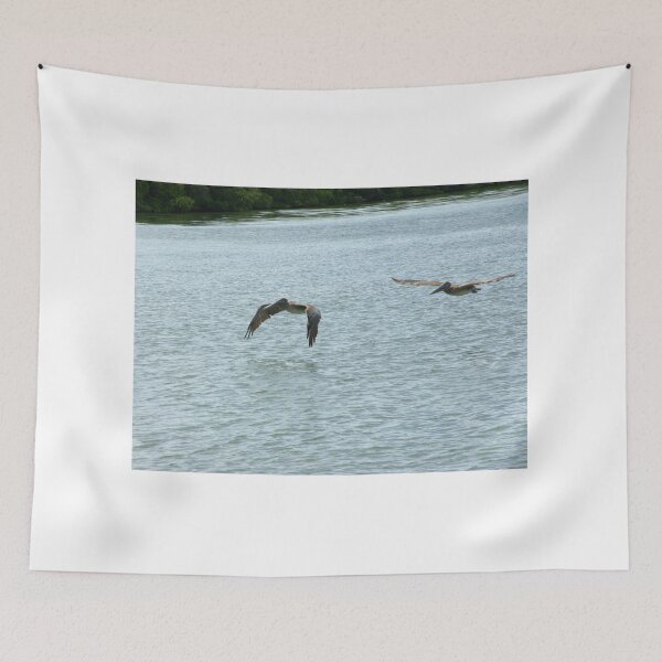 Item preview, Two Pelicans Flying Over Water designed and sold by MercerImages.