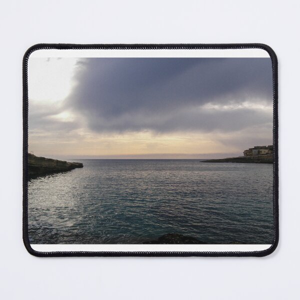 Item preview, Moody Seaside Sunset Over Calm Sea With Cloudy Sky And Rocky Coastline At Dusk designed and sold by Nmallia.