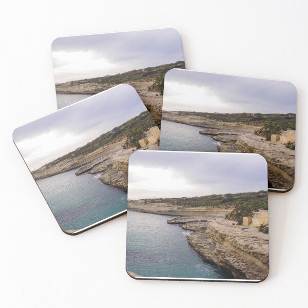 Item preview, Rocky Cliff Coastline Over Calm Sea With Old Stone Buildings And Overcast Sky designed and sold by Nmallia.