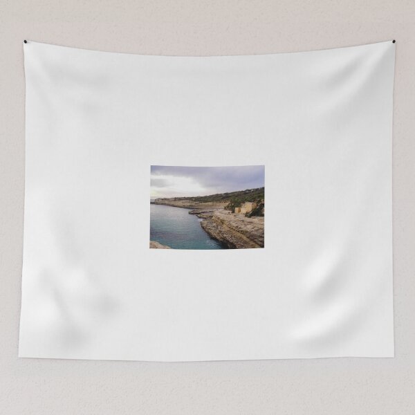 Item preview, Rocky Cliff Coastline Over Calm Sea With Old Stone Buildings And Overcast Sky designed and sold by Nmallia.