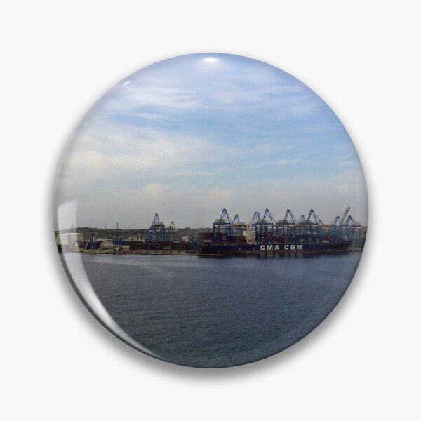 Item preview, Container Ship at Industrial Port With Cranes and Shipping Containers Under Cloudy Sky designed and sold by Nmallia.
