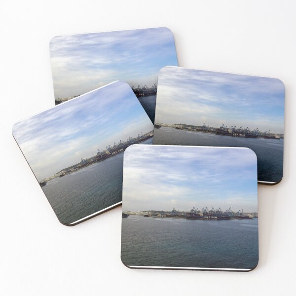 Item preview, Container Ship at Industrial Port With Cranes and Shipping Containers Under Cloudy Sky designed and sold by Nmallia.