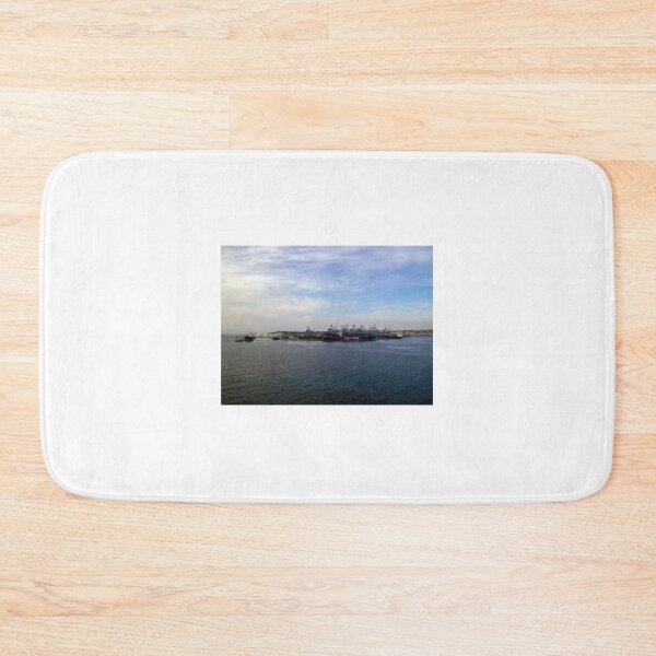 Item preview, Container Ship at Industrial Port With Cranes and Shipping Containers Under Cloudy Sky designed and sold by Nmallia.