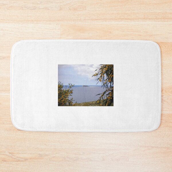 Item preview, Island Sea View Framed by Yellow Mimosa Flowers Over Calm Coastal Waters and Rocky Islet designed and sold by Nmallia.