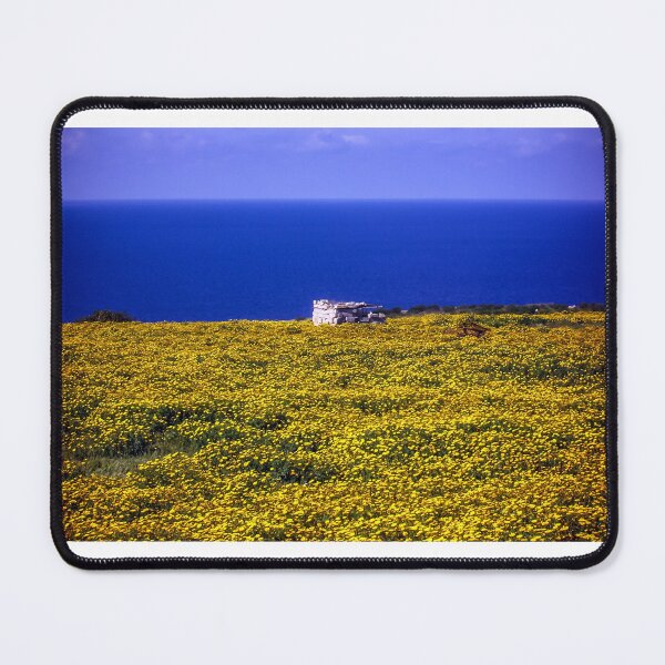 Item preview, Yellow Wildflower Field Overlooking Blue Sea With Small Stone Shelter On Coastal Horizon designed and sold by Nmallia.