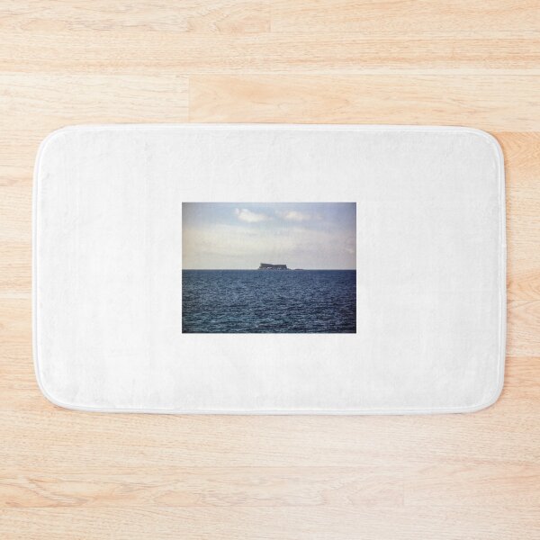 Item preview, Distant Flat-Topped Island On a Calm Ocean Horizon Under Soft Blue Sky designed and sold by Nmallia.