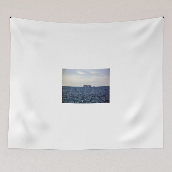Item preview, Distant Flat-Topped Island On a Calm Ocean Horizon Under Soft Blue Sky designed and sold by Nmallia.