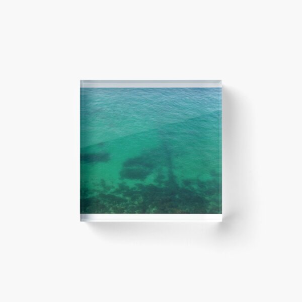 Item preview, Aerial View of Turquoise Ocean Water and Rocky Reef Shadows Over Shallow Sea designed and sold by Nmallia.