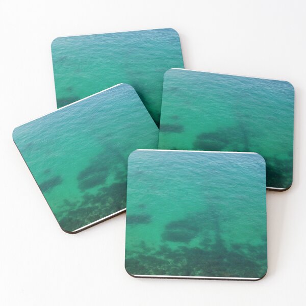 Item preview, Aerial View of Turquoise Ocean Water and Rocky Reef Shadows Over Shallow Sea designed and sold by Nmallia.