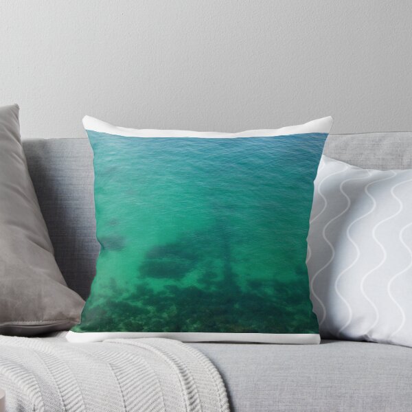 Item preview, Aerial View of Turquoise Ocean Water and Rocky Reef Shadows Over Shallow Sea designed and sold by Nmallia.