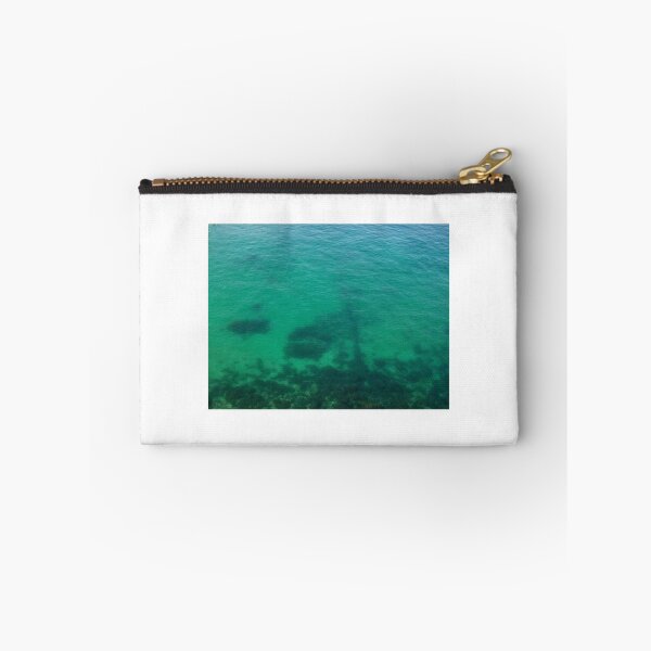 Item preview, Aerial View of Turquoise Ocean Water and Rocky Reef Shadows Over Shallow Sea designed and sold by Nmallia.