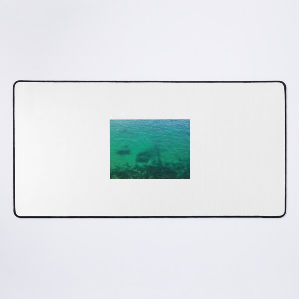 Item preview, Aerial View of Turquoise Ocean Water and Rocky Reef Shadows Over Shallow Sea designed and sold by Nmallia.