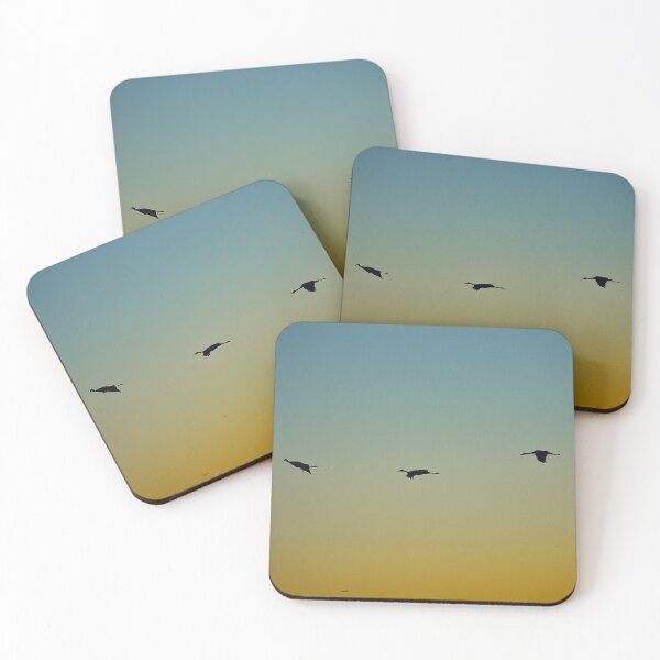 Item preview, Silhouetted Birds in Flight at Sunrise designed and sold by MercerImages.