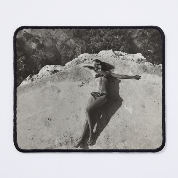 Item preview, Vintage fashion model Natahli (Natalie) Nickerson Paine wearing a bikini, lying on platform near water, Montego Bay, Jamaica black and white photograph poster art print designed and sold by Astrid Arkhangelsky.