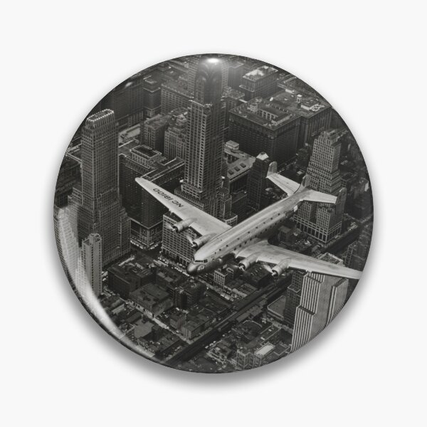 Item preview, A DC-4 Flying Over New York City, 1939, Manhattan skyscrapers and skyline black and white vintage photograph poster art print designed and sold by Astrid Arkhangelsky.