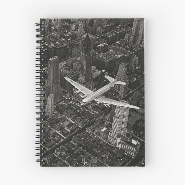 Item preview, A DC-4 Flying Over New York City, 1939, Manhattan skyscrapers and skyline black and white vintage photograph poster art print designed and sold by Astrid Arkhangelsky.