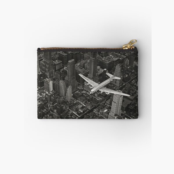 Item preview, A DC-4 Flying Over New York City, 1939, Manhattan skyscrapers and skyline black and white vintage photograph poster art print designed and sold by Astrid Arkhangelsky.