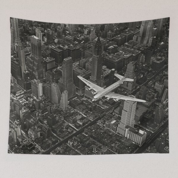Item preview, A DC-4 Flying Over New York City, 1939, Manhattan skyscrapers and skyline black and white vintage photograph poster art print designed and sold by Astrid Arkhangelsky.