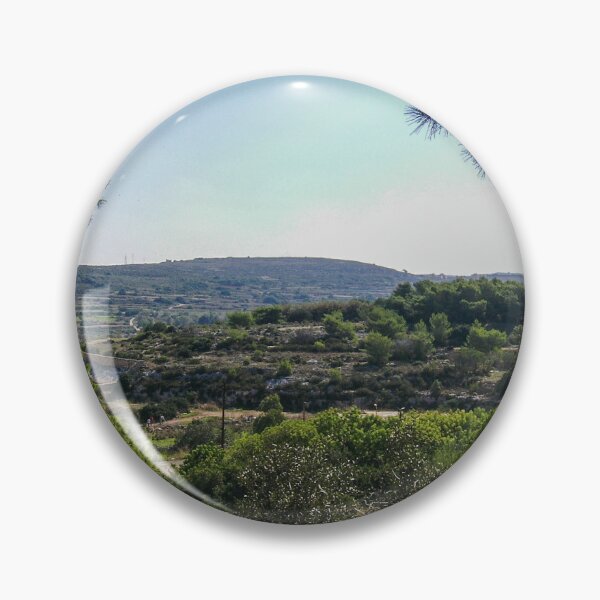 Item preview, Sunlit Mediterranean Countryside Valley Framed by Pine Trees Overlooking Rolling Hills and Olive Groves designed and sold by Nmallia.