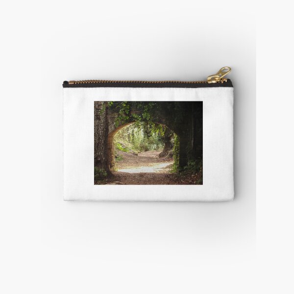 Item preview, Stone Archway Framing a Sunlit Forest Path Through Lush Woodland and Ancient Trees designed and sold by Nmallia.