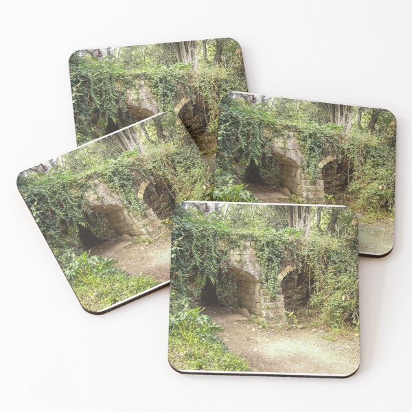Item preview, Overgrown Stone Arch Ruins in a Forest Path Covered With Ivy and Moss designed and sold by Nmallia.